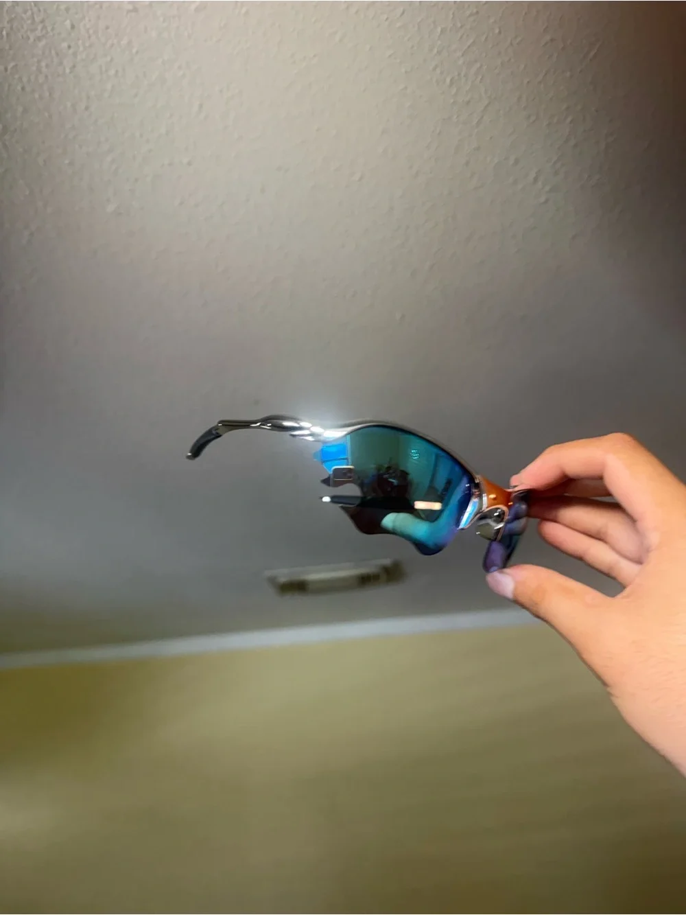 Men's Sport Sunglasses with Blue Mirrored Lenses and Orange Bridge Oakleys